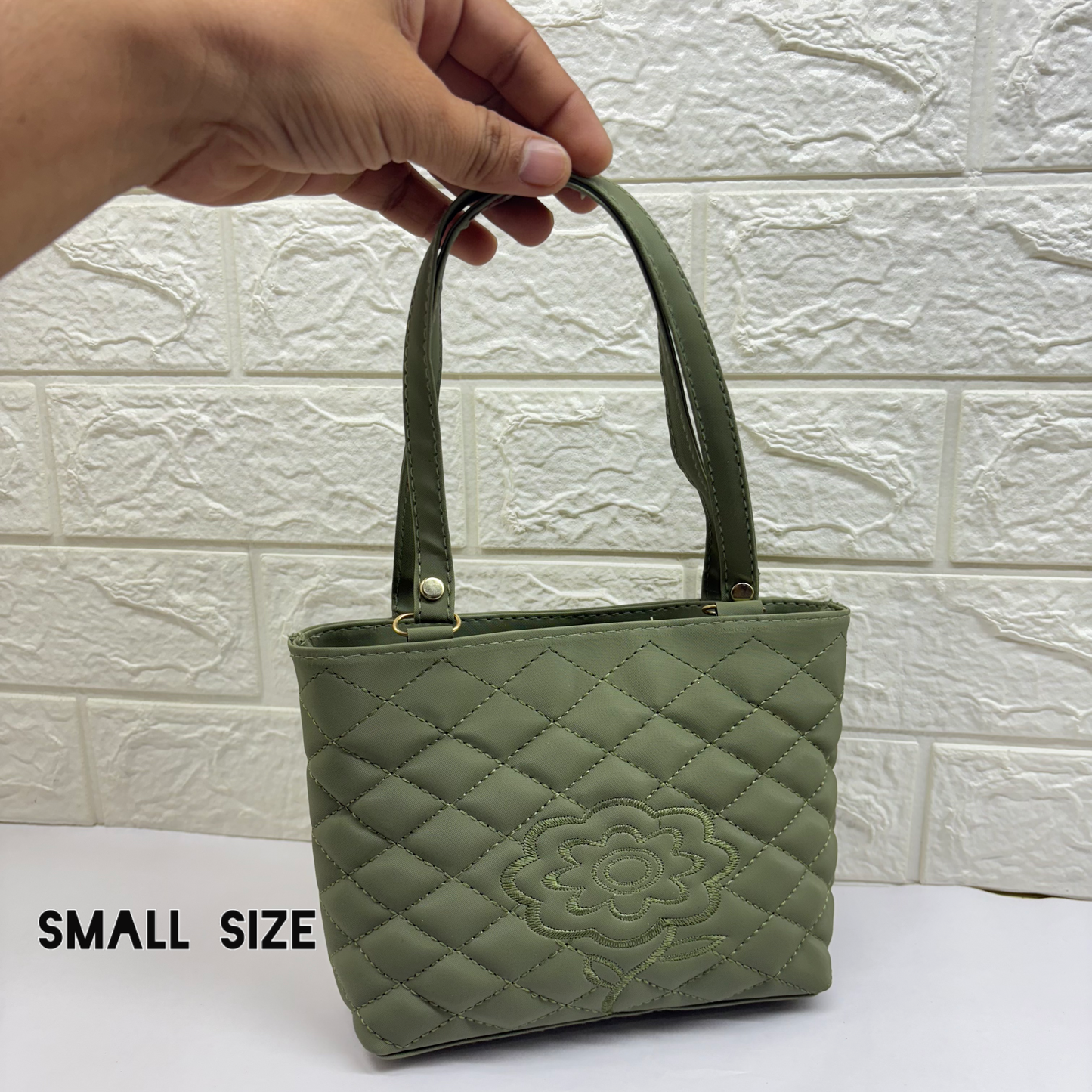 Woman Handheld bag