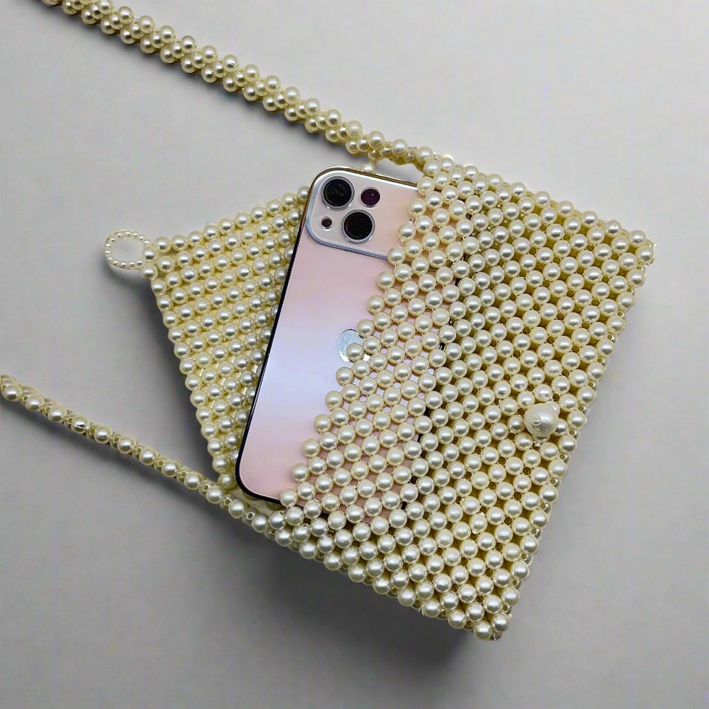 Handmade pearl bags are made of pearl, which is shiny and luxurious in the sun. We string all the together by hand. Our exquisite and elegant bags are firm and they don't deform easily.