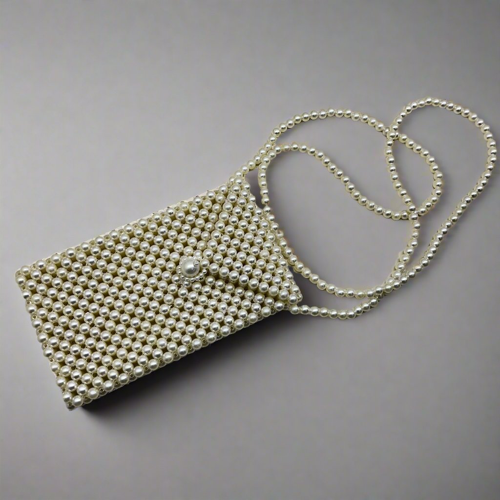 Handmade pearl bags are made of pearl, which is shiny and luxurious in the sun. We string all the together by hand. Our exquisite and elegant bags are firm and they don't deform easil