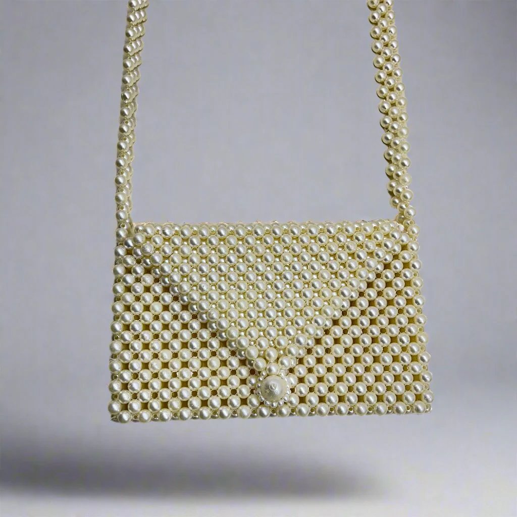 Handmade pearl bags are made of pearl, which is shiny and luxurious in the sun. We string all the  together by hand. Our exquisite and elegant bags are firm and they don't deform easily.